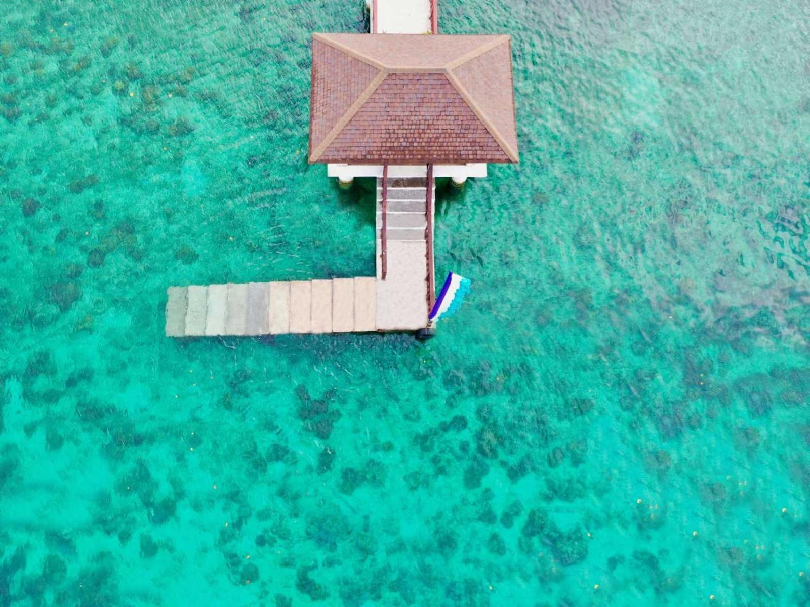 Crusoe Cabins Costa Azalea Samal Exteriör bild